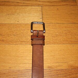Brown belt with silver buckle